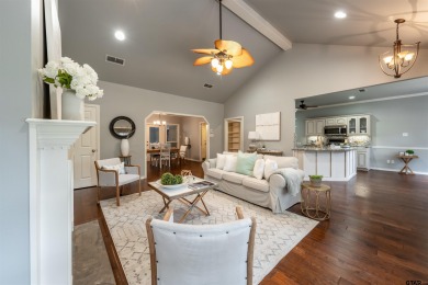 Experience resort-style living in this beautiful 4-bedroom on Hide-A-Way Lake Golf Course in Texas - for sale on GolfHomes.com, golf home, golf lot