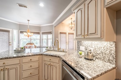 Experience resort-style living in this beautiful 4-bedroom on Hide-A-Way Lake Golf Course in Texas - for sale on GolfHomes.com, golf home, golf lot