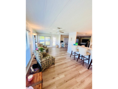This beautiful two-bedroom, two-bath home is located in the on Pine Lakes Country Club in Florida - for sale on GolfHomes.com, golf home, golf lot