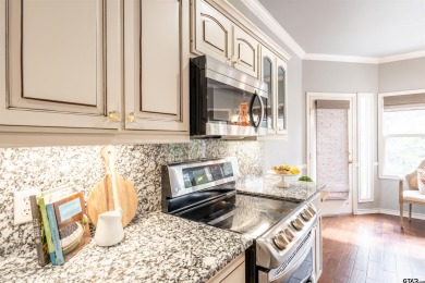 Experience resort-style living in this beautiful 4-bedroom on Hide-A-Way Lake Golf Course in Texas - for sale on GolfHomes.com, golf home, golf lot