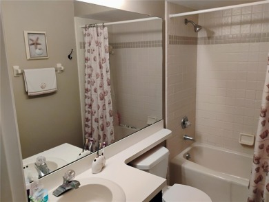 Custom built 3-bedroom, 2-bathroom masonry-built home nestled on on Glen Abbey Golf Club in Florida - for sale on GolfHomes.com, golf home, golf lot
