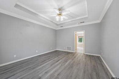 Experience resort-style living in this beautiful 4-bedroom on Hide-A-Way Lake Golf Course in Texas - for sale on GolfHomes.com, golf home, golf lot