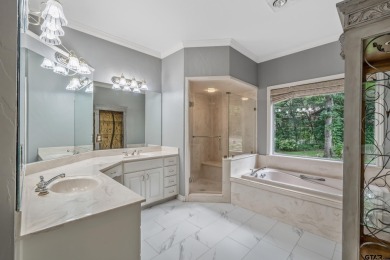 Experience resort-style living in this beautiful 4-bedroom on Hide-A-Way Lake Golf Course in Texas - for sale on GolfHomes.com, golf home, golf lot