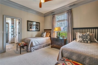 This exclusive property, nestled on one of only 32 deep-water on Colleton River Plantation Club in South Carolina - for sale on GolfHomes.com, golf home, golf lot