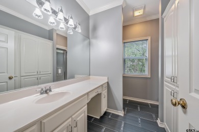 Experience resort-style living in this beautiful 4-bedroom on Hide-A-Way Lake Golf Course in Texas - for sale on GolfHomes.com, golf home, golf lot