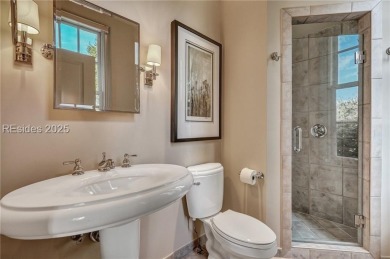 This exclusive property, nestled on one of only 32 deep-water on Colleton River Plantation Club in South Carolina - for sale on GolfHomes.com, golf home, golf lot