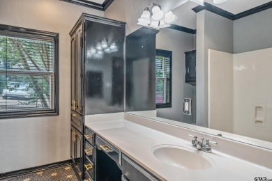 Experience resort-style living in this beautiful 4-bedroom on Hide-A-Way Lake Golf Course in Texas - for sale on GolfHomes.com, golf home, golf lot