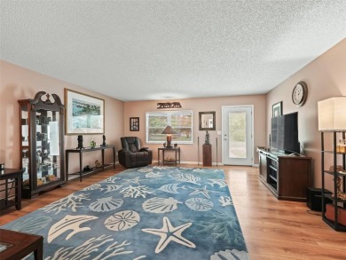 This spacious 2-bedroom, 2 1/2 -bathroom townhome is nestled in on On Top of the World Golf Course in Florida - for sale on GolfHomes.com, golf home, golf lot