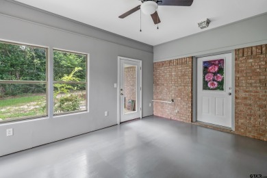 Experience resort-style living in this beautiful 4-bedroom on Hide-A-Way Lake Golf Course in Texas - for sale on GolfHomes.com, golf home, golf lot