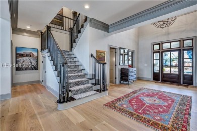 This exclusive property, nestled on one of only 32 deep-water on Colleton River Plantation Club in South Carolina - for sale on GolfHomes.com, golf home, golf lot