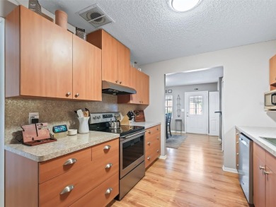This spacious 2-bedroom, 2 1/2 -bathroom townhome is nestled in on On Top of the World Golf Course in Florida - for sale on GolfHomes.com, golf home, golf lot