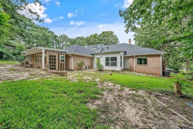 Experience resort-style living in this beautiful 4-bedroom on Hide-A-Way Lake Golf Course in Texas - for sale on GolfHomes.com, golf home, golf lot