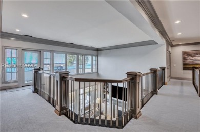 This exclusive property, nestled on one of only 32 deep-water on Colleton River Plantation Club in South Carolina - for sale on GolfHomes.com, golf home, golf lot