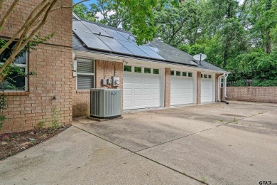 Experience resort-style living in this beautiful 4-bedroom on Hide-A-Way Lake Golf Course in Texas - for sale on GolfHomes.com, golf home, golf lot
