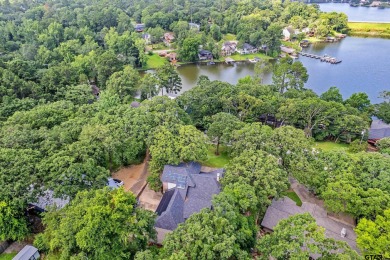 Experience resort-style living in this beautiful 4-bedroom on Hide-A-Way Lake Golf Course in Texas - for sale on GolfHomes.com, golf home, golf lot