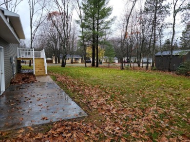 Spacious bi-level that has been fully renovated inside and out on Twin Birch Golf Club in Michigan - for sale on GolfHomes.com, golf home, golf lot