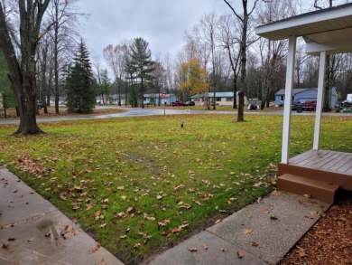 Spacious bi-level that has been fully renovated inside and out on Twin Birch Golf Club in Michigan - for sale on GolfHomes.com, golf home, golf lot