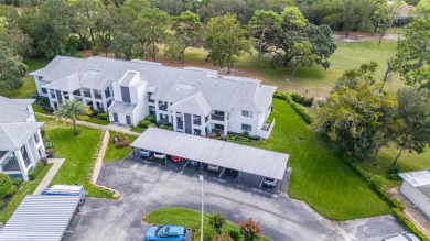 Main level end unit 2/2 condo with beautiful golf course view in on Sugarmill Woods Golf and Country Club in Florida - for sale on GolfHomes.com, golf home, golf lot