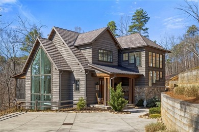 Nestled along the pristine shoreline of Lake Keowee, this on The Reserve At Lake Keowee in South Carolina - for sale on GolfHomes.com, golf home, golf lot