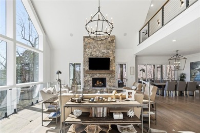 Nestled along the pristine shoreline of Lake Keowee, this on The Reserve At Lake Keowee in South Carolina - for sale on GolfHomes.com, golf home, golf lot