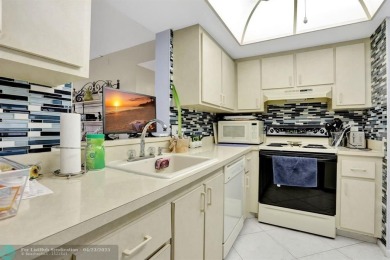 Welcome to this 1st floor, 2/2 in beautiful, quiet Palm Springs on Oriole Golf and Tennis Club in Florida - for sale on GolfHomes.com, golf home, golf lot