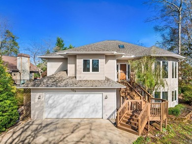 Beautiful custom-built home with a covered boat slip and on The Trail At Chickasaw Pointe in South Carolina - for sale on GolfHomes.com, golf home, golf lot