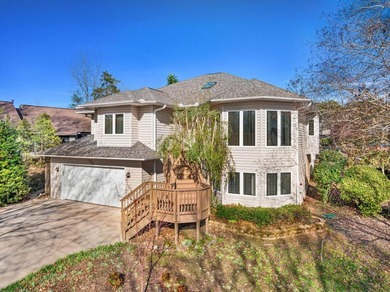 Beautiful custom-built home with a covered boat slip and on The Trail At Chickasaw Pointe in South Carolina - for sale on GolfHomes.com, golf home, golf lot