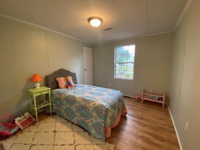 Come and see what Lake Marion living has to offer. This home at on Players Course At Wyboo Plantation in South Carolina - for sale on GolfHomes.com, golf home, golf lot