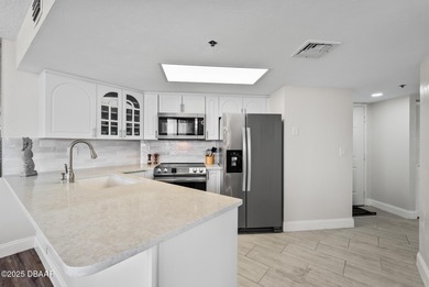 Situated on the bright Southwest corner, this 2BR/2BA fully on Oceans Golf Club in Florida - for sale on GolfHomes.com, golf home, golf lot