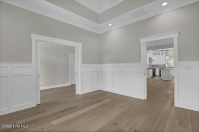 Prepare to be captivated by this stunning new construction on Belvedere Country Club in North Carolina - for sale on GolfHomes.com, golf home, golf lot