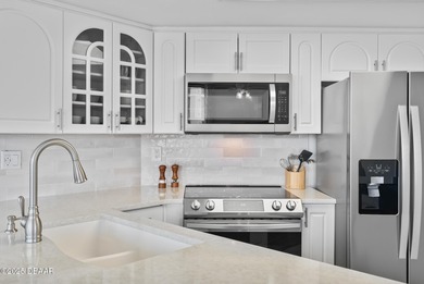 Situated on the bright Southwest corner, this 2BR/2BA fully on Oceans Golf Club in Florida - for sale on GolfHomes.com, golf home, golf lot