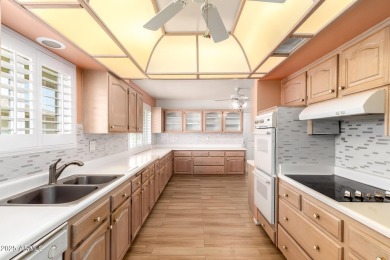 Welcome to your Sun City retreat! This charming 3-bedroom on Sun City Lakes West and East in Arizona - for sale on GolfHomes.com, golf home, golf lot