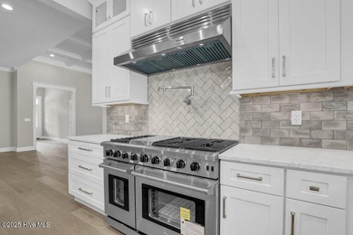 Prepare to be captivated by this stunning new construction on Belvedere Country Club in North Carolina - for sale on GolfHomes.com, golf home, golf lot