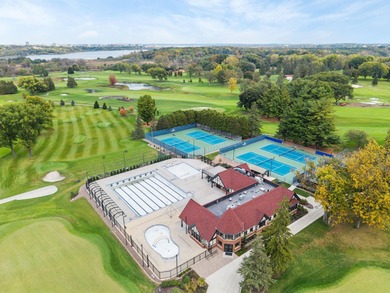 This timeless Nakoma home blends classic charm with stunning on Nakoma Golf Club in Wisconsin - for sale on GolfHomes.com, golf home, golf lot