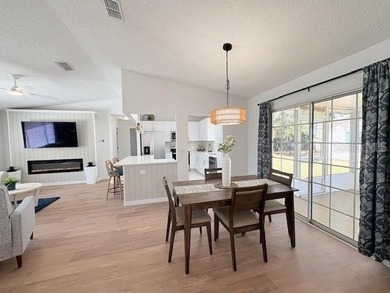 This beautifully FURNISHED and REMODELED home sitting on a on The Links of Spruce Creek in Florida - for sale on GolfHomes.com, golf home, golf lot