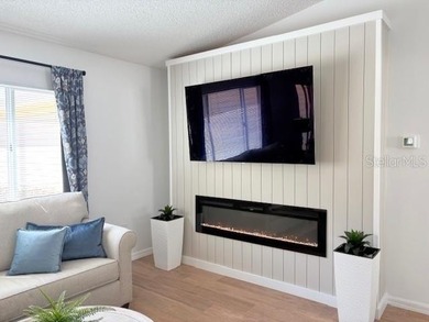 This beautifully FURNISHED and REMODELED home sitting on a on The Links of Spruce Creek in Florida - for sale on GolfHomes.com, golf home, golf lot