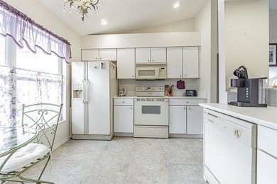 Enjoy starting your day with some of the most amazing views in on Tampa Bay Golf and Country Club in Florida - for sale on GolfHomes.com, golf home, golf lot