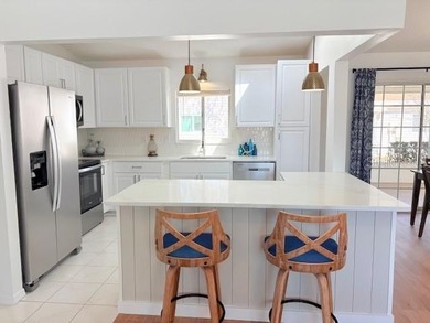 This beautifully FURNISHED and REMODELED home sitting on a on The Links of Spruce Creek in Florida - for sale on GolfHomes.com, golf home, golf lot