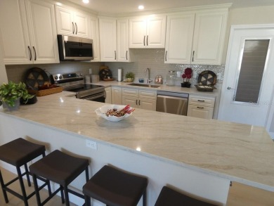 An amazing 2-bedroom, 2-bath Villa/Condo, with Large 1 Car on Highland Lakes Executive Golf Course in Florida - for sale on GolfHomes.com, golf home, golf lot