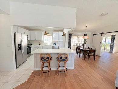 This beautifully FURNISHED and REMODELED home sitting on a on The Links of Spruce Creek in Florida - for sale on GolfHomes.com, golf home, golf lot