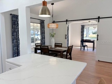 This beautifully FURNISHED and REMODELED home sitting on a on The Links of Spruce Creek in Florida - for sale on GolfHomes.com, golf home, golf lot