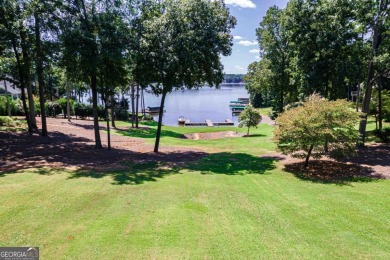 Experience refined lake access living at 1011 Plantation Point on Reynolds Lake Oconee - The Oconee in Georgia - for sale on GolfHomes.com, golf home, golf lot