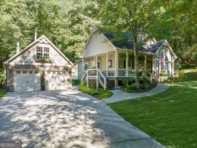 Step into serenity and style in this stunning craftsman-style on White Path Golf Club in Georgia - for sale on GolfHomes.com, golf home, golf lot