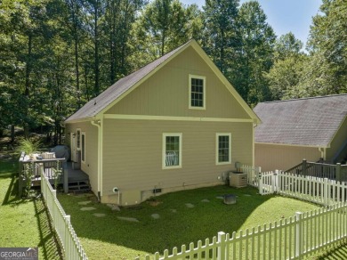 Step into serenity and style in this stunning craftsman-style on White Path Golf Club in Georgia - for sale on GolfHomes.com, golf home, golf lot