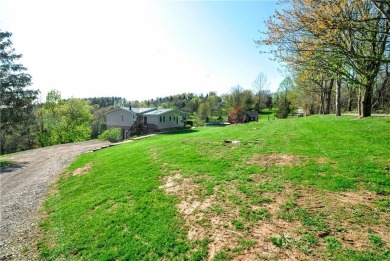 Nestled on just over 2 acres of picturesque land within the on Lone Pine Golf Club  in Pennsylvania - for sale on GolfHomes.com, golf home, golf lot