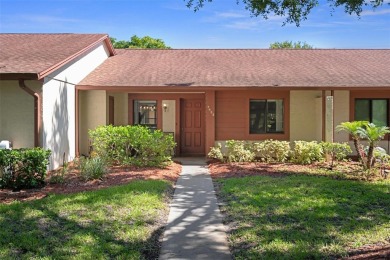 Come home to relaxed Florida living in a beautifully cared-for on Beacon Woods Golf Club in Florida - for sale on GolfHomes.com, golf home, golf lot