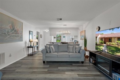 Come home to relaxed Florida living in a beautifully cared-for on Beacon Woods Golf Club in Florida - for sale on GolfHomes.com, golf home, golf lot