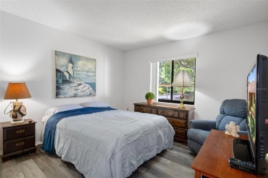 Come home to relaxed Florida living in a beautifully cared-for on Beacon Woods Golf Club in Florida - for sale on GolfHomes.com, golf home, golf lot