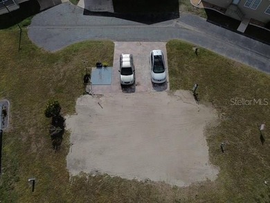 Large vacant lot located in a desirable 55+ manufactured home on Kings Gate Golf Club in Florida - for sale on GolfHomes.com, golf home, golf lot