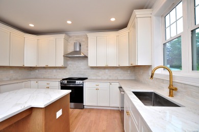 Welcome to this stunning new construction by Coccomo Builders on Shuttle Meadow Country Club in Connecticut - for sale on GolfHomes.com, golf home, golf lot
